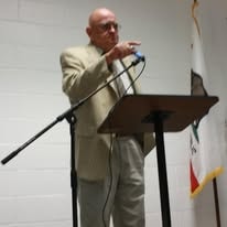 Founder delivering keynote speech at Operation New Hope graduation 2017