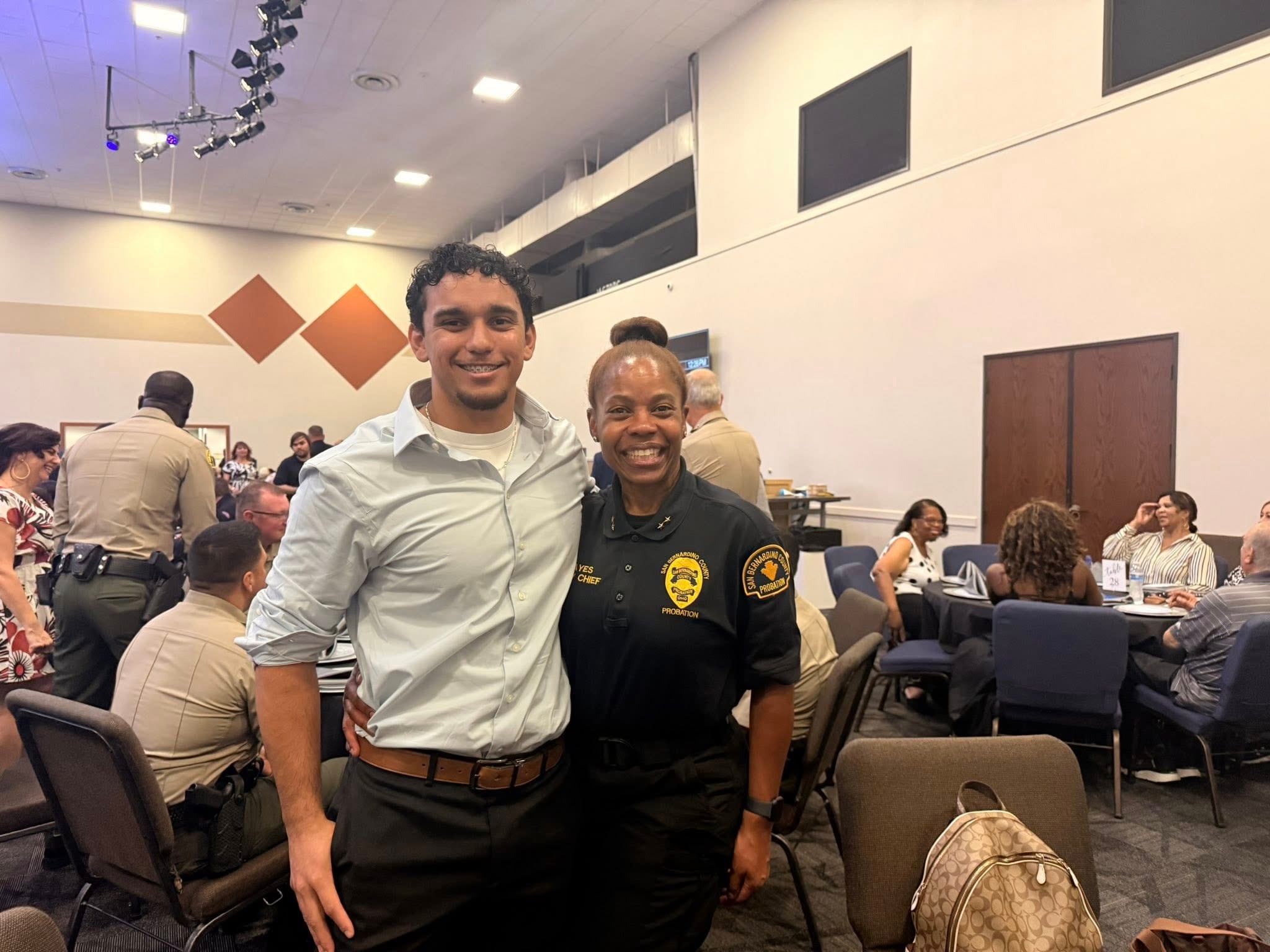 Mario with San Bernardino County Probation Chief at community event