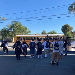 Student beach day 2022 — students boarding school bus