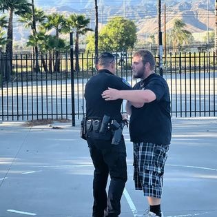 VIP SBPD park day — officer and youth interacting outdoors